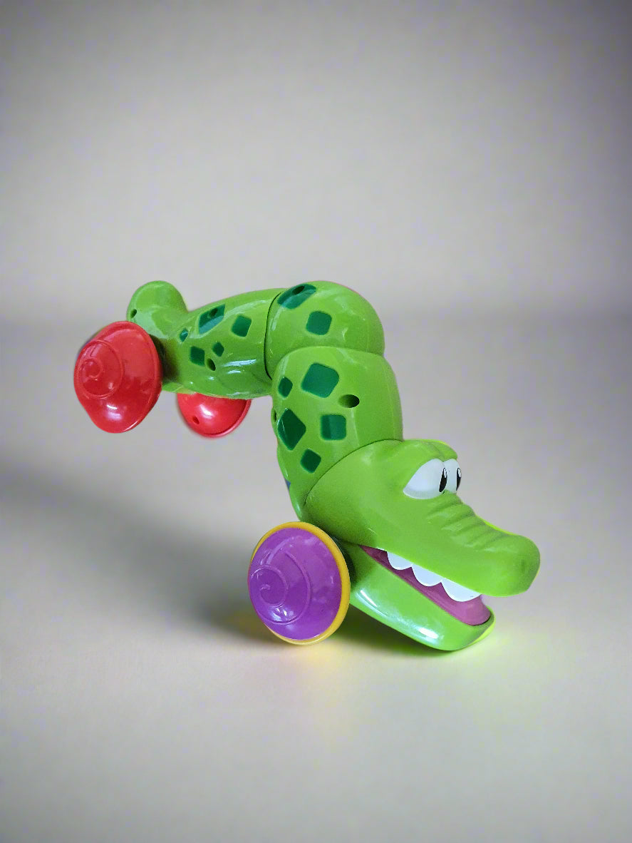 Press & Roll Crocodile Toy – Self-Retracting Action!