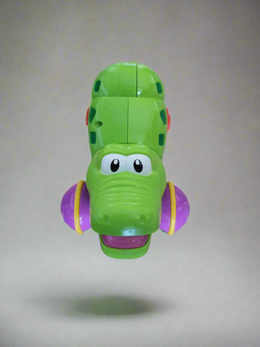 Press & Roll Crocodile Toy – Self-Retracting Action!